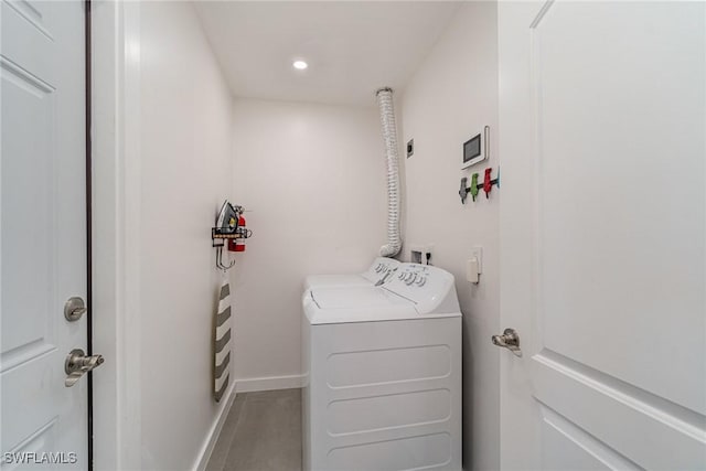 laundry room with independent washer and dryer