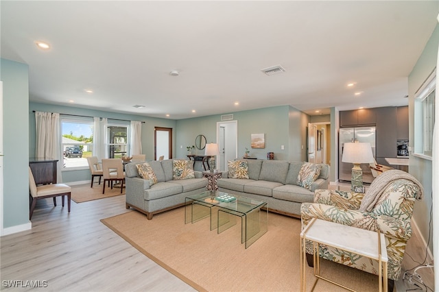 living room featuring light hardwood / wood-style floors