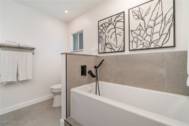 bathroom with toilet and a bathtub