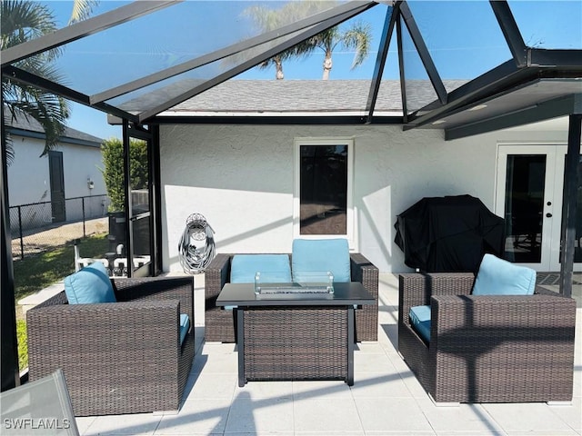 view of patio with an outdoor hangout area and a lanai