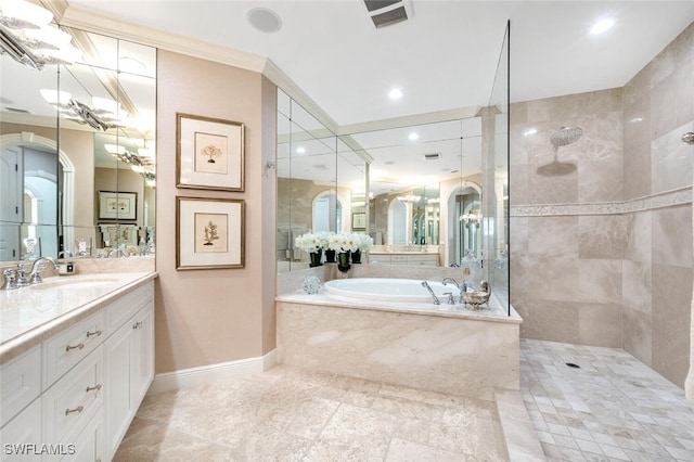 bathroom with vanity, crown molding, and independent shower and bath