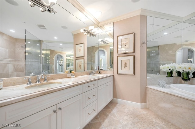 bathroom featuring vanity, crown molding, and separate shower and tub