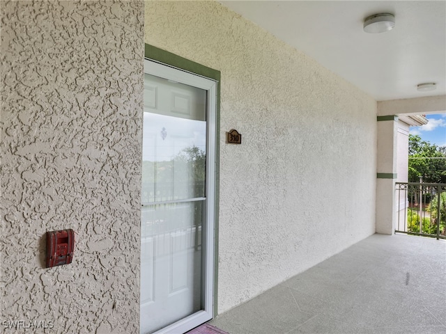 doorway to property with a balcony