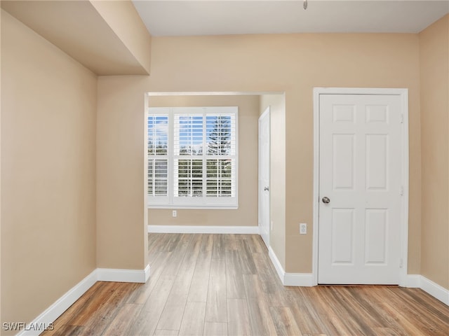 empty room featuring hardwood / wood-style floors