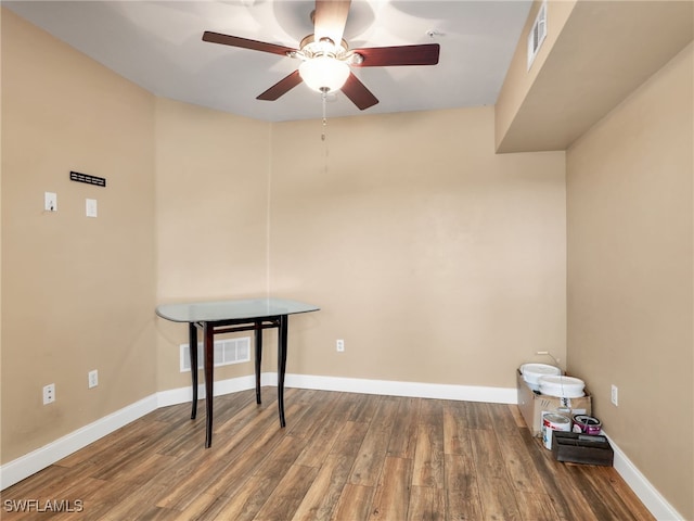 miscellaneous room featuring hardwood / wood-style flooring and ceiling fan