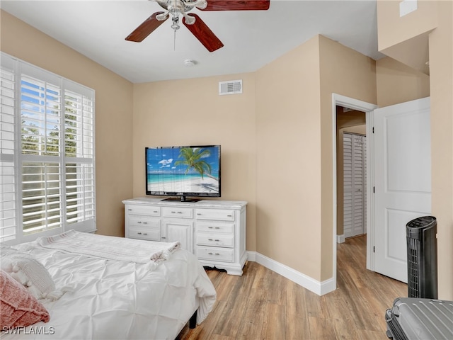 bedroom featuring ceiling fan and light hardwood / wood-style floors