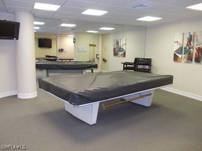 playroom with a drop ceiling, carpet, and baseboards