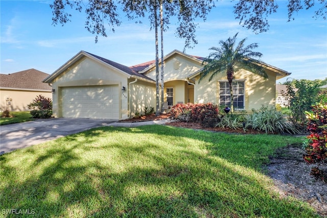 single story home featuring a garage and a front lawn