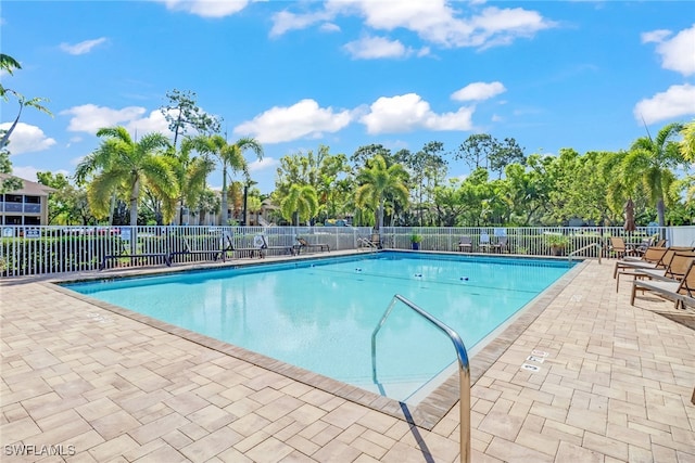 view of swimming pool featuring a patio