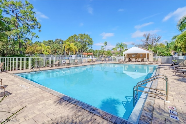 view of swimming pool featuring a patio