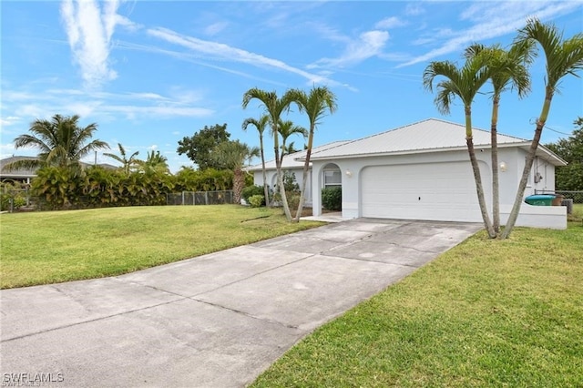 ranch-style home with a garage and a front yard