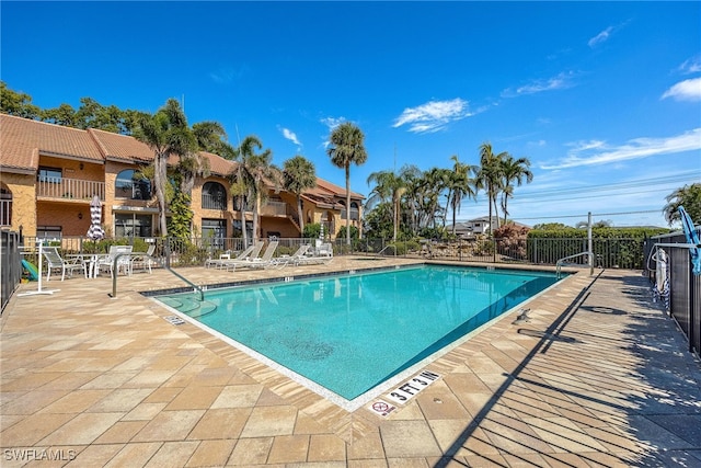 view of pool featuring a patio