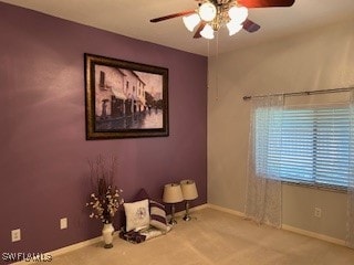 spare room with ceiling fan and carpet floors