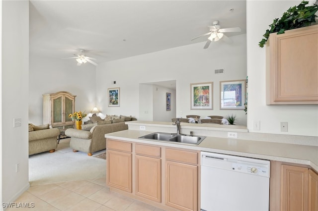 kitchen featuring dishwasher, ceiling fan, sink, and light brown cabinets