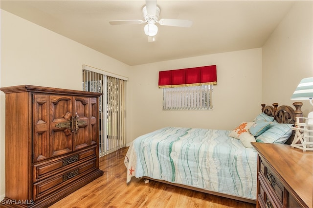 bedroom with ceiling fan and light wood-type flooring