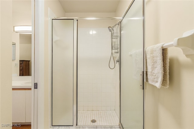 bathroom with vanity and an enclosed shower