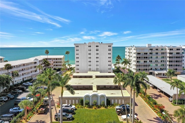 view of building exterior with a water view