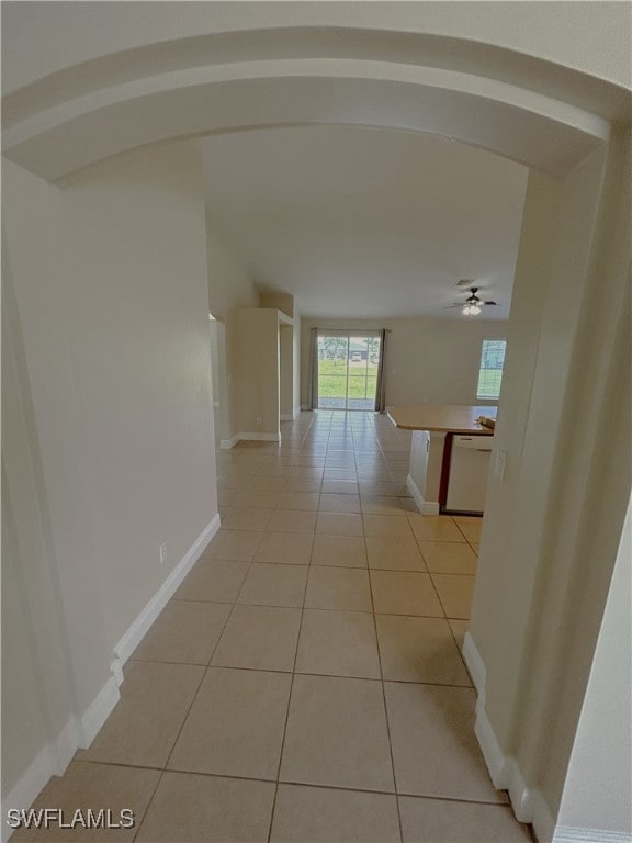 hallway featuring light tile patterned floors