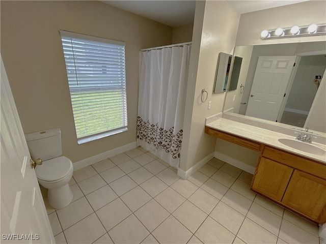 bathroom with vanity, toilet, tile patterned flooring, and a shower with shower curtain