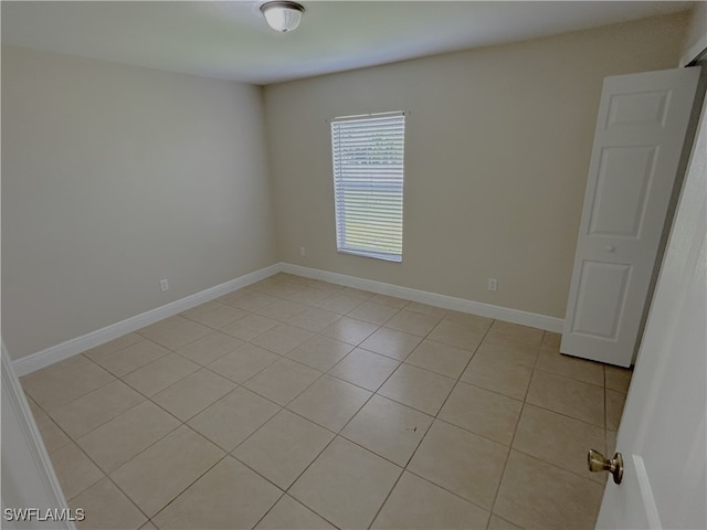 view of tiled spare room