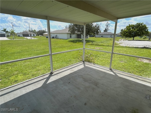 unfurnished sunroom with a healthy amount of sunlight