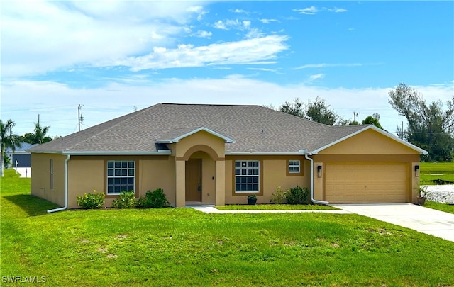 single story home featuring a front lawn and a garage