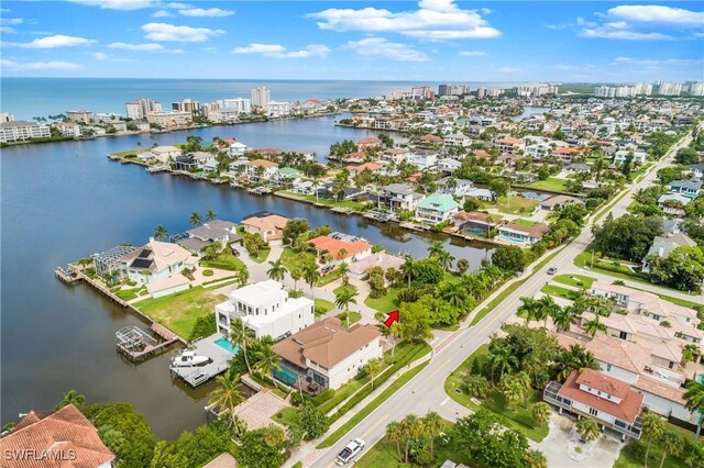 bird's eye view with a water view