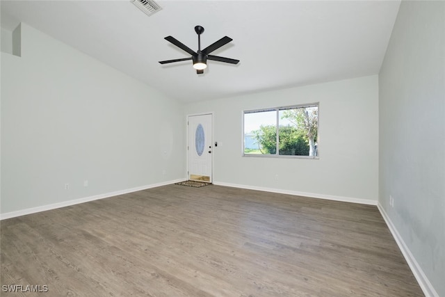 unfurnished room with hardwood / wood-style floors and ceiling fan