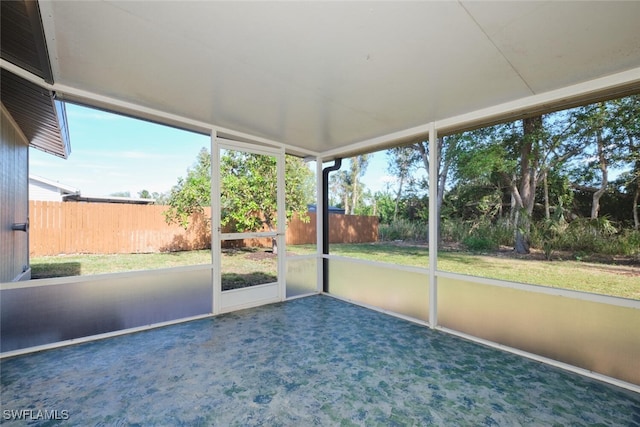 unfurnished sunroom featuring plenty of natural light