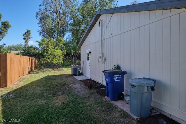 view of yard with central air condition unit