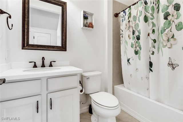 full bathroom featuring vanity, toilet, shower / bath combo, and tile patterned flooring