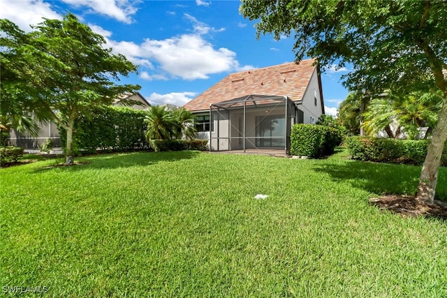 view of yard featuring a lanai