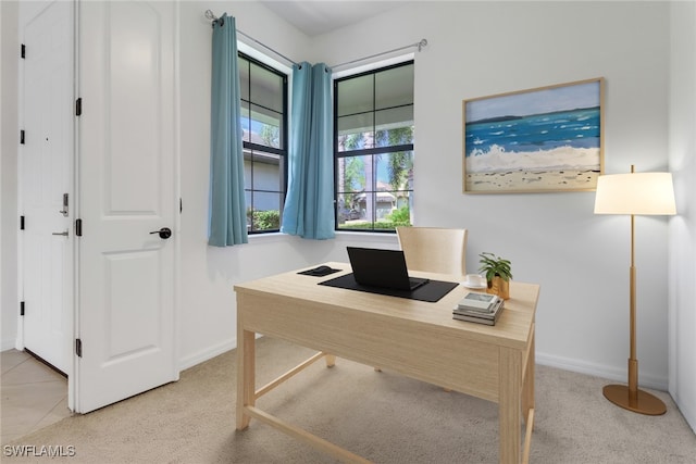 office area with light colored carpet