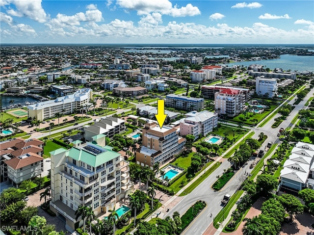 aerial view featuring a water view and a city view