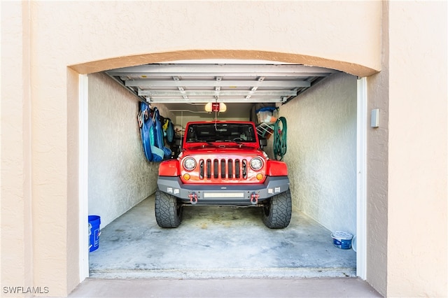 garage featuring a textured wall