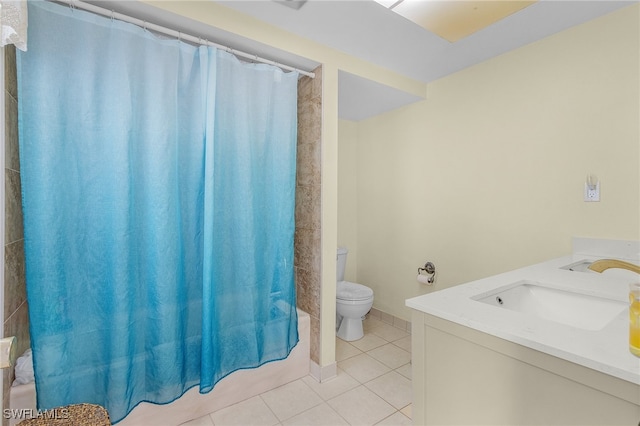 full bathroom with vanity, toilet, tile patterned floors, and shower / bath combo with shower curtain