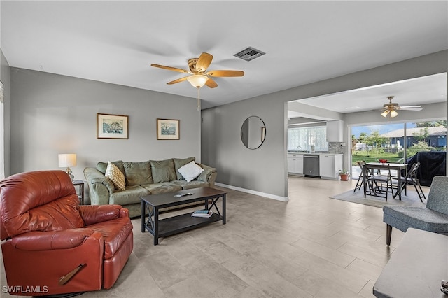 living room featuring ceiling fan