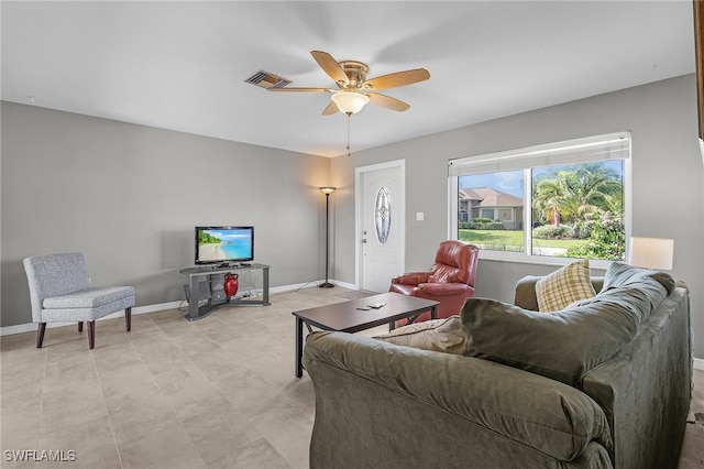 living room featuring ceiling fan