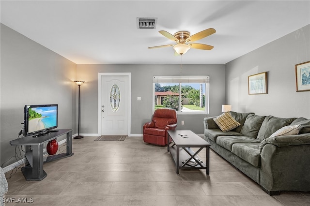 living room with ceiling fan