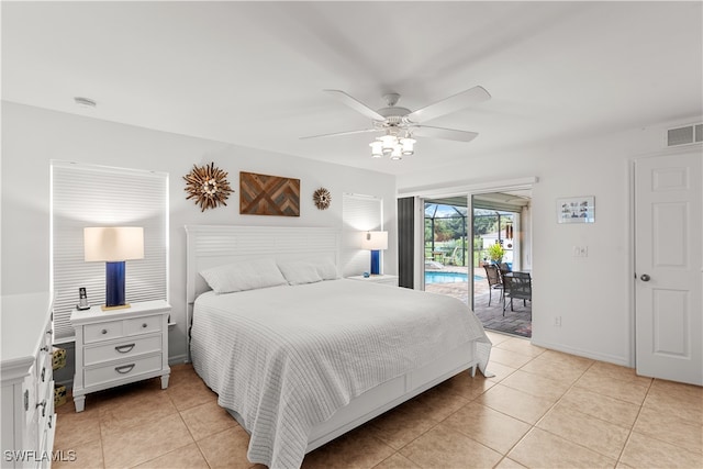 bedroom with ceiling fan, light tile patterned floors, and access to exterior