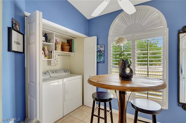 laundry room with washing machine and dryer, light tile patterned floors, and ceiling fan