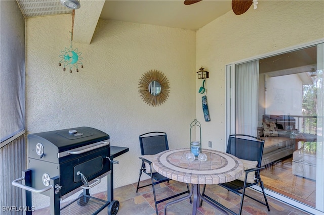 view of patio featuring grilling area and ceiling fan