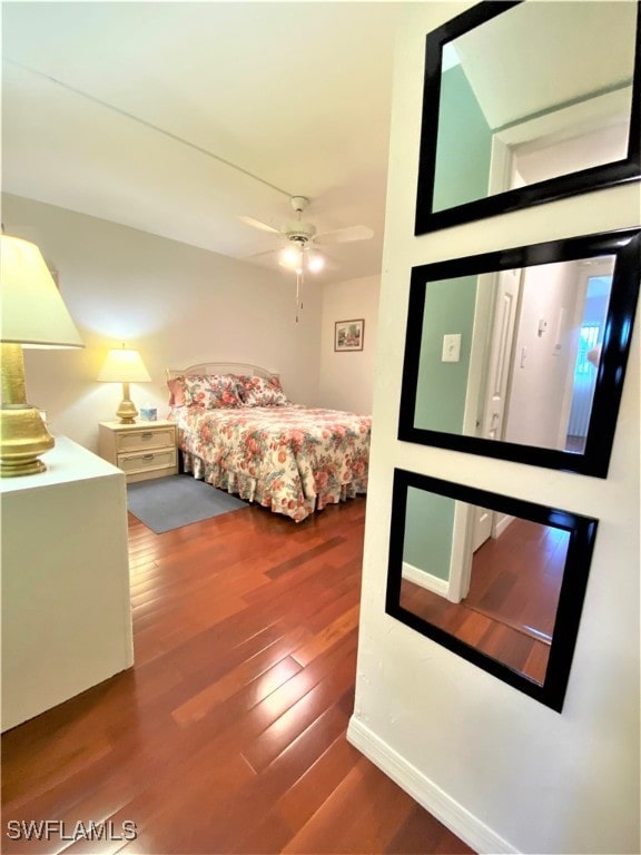 bedroom featuring hardwood / wood-style floors and ceiling fan