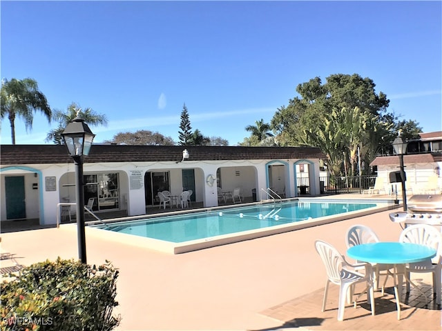 view of pool with a patio area