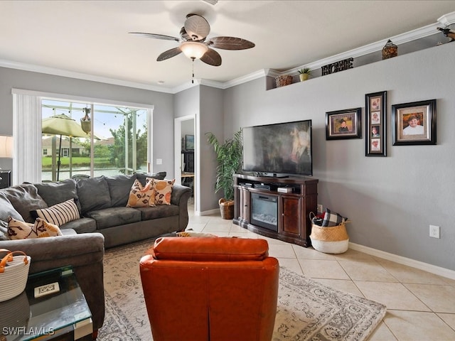 living room with crown molding, light tile patterned flooring, and ceiling fan