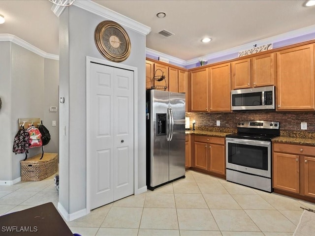 kitchen featuring visible vents, backsplash, appliances with stainless steel finishes, crown molding, and light tile patterned floors