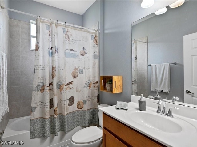 bathroom with shower / bath combination with curtain, toilet, and vanity