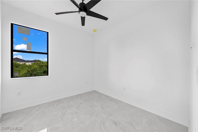 spare room featuring ceiling fan