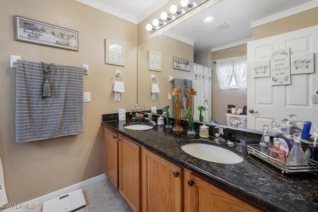 bathroom featuring tile patterned flooring, ornamental molding, and vanity