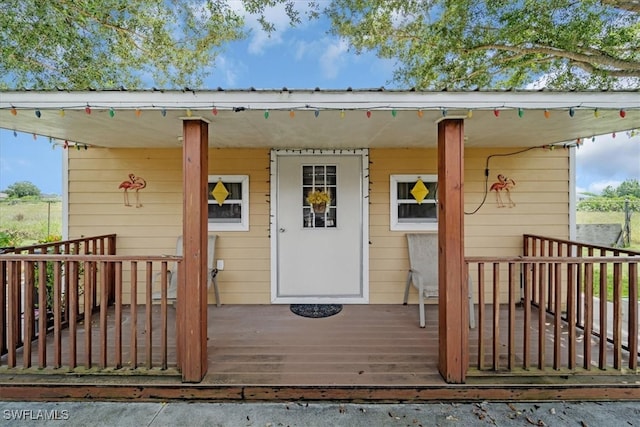 entrance to property with covered porch